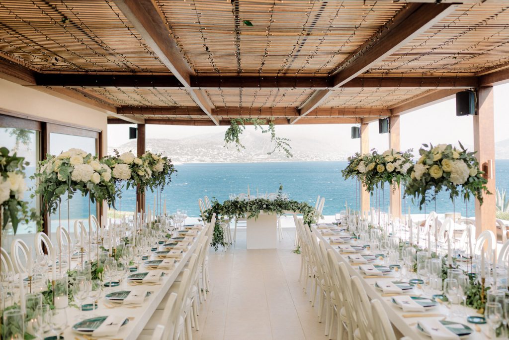 long white tables and lush greenery