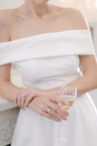 bride holding champagne